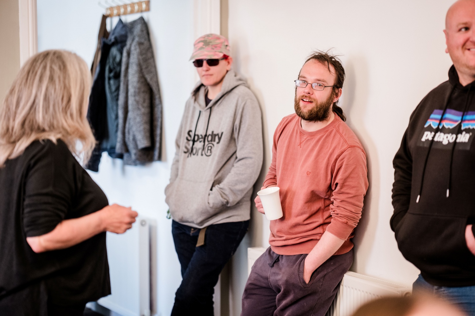 Matthew's Hub Staff and standing up having a chat