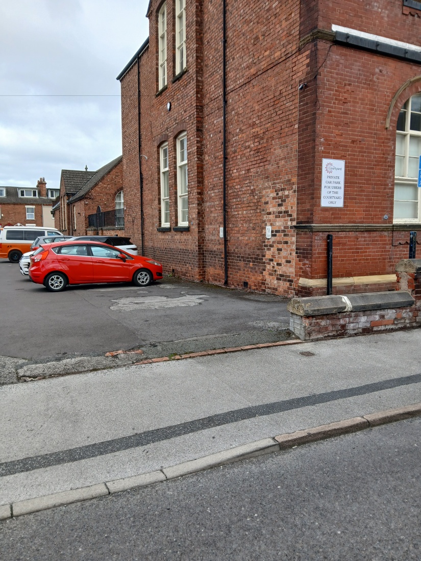 The rear of the Courtyard venue with parking
